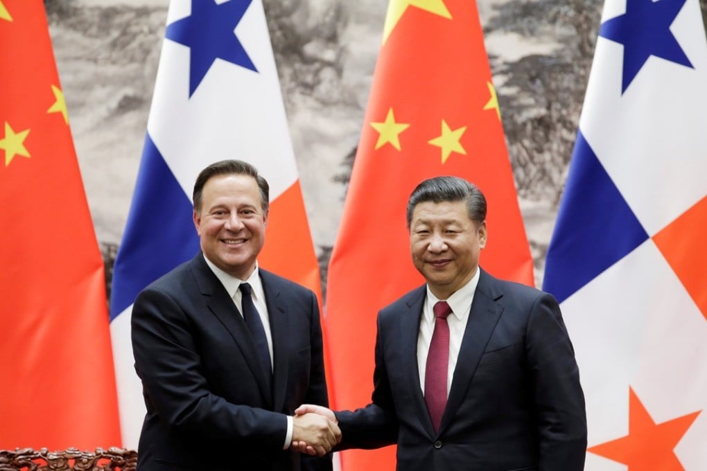 Panama’s President Juan Carlos Varela met Xi Jinping for a signing ceremony in Beijing on Friday. Photo: Reuters