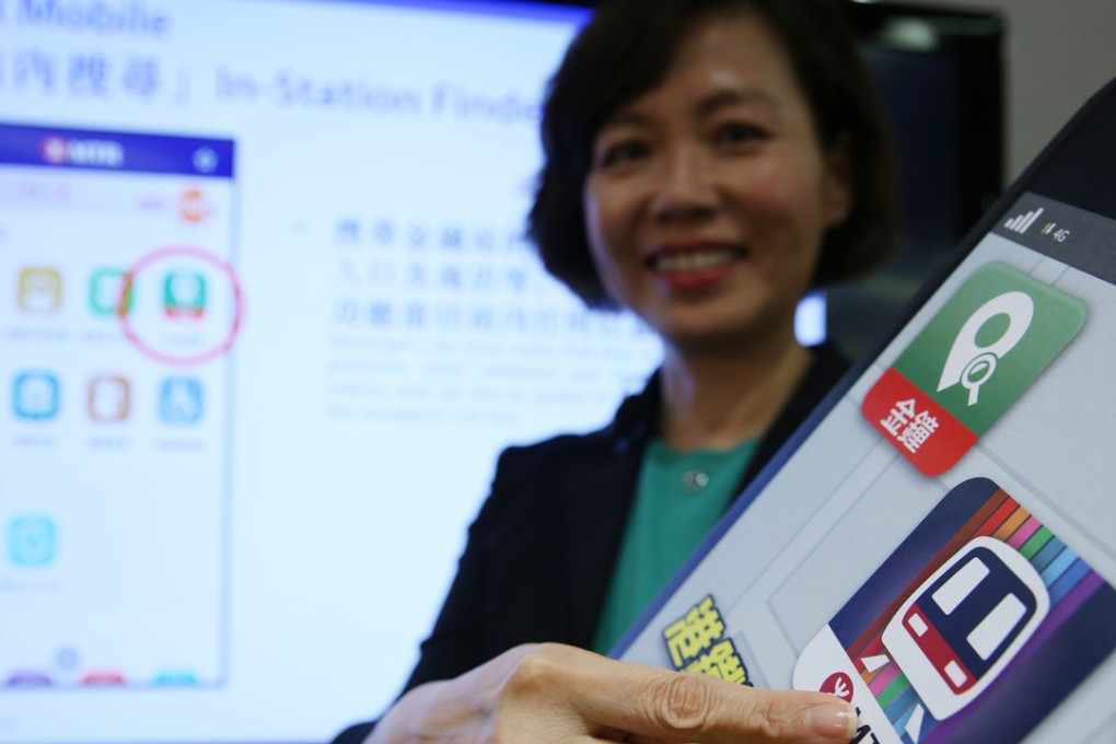 Jeny Yeung, commercial director of Hong Kong’s MTR Corporation, demonstrates the new MTR mobile app at a press conference in Kowloon Bay in August. Photo: Sam Tsang