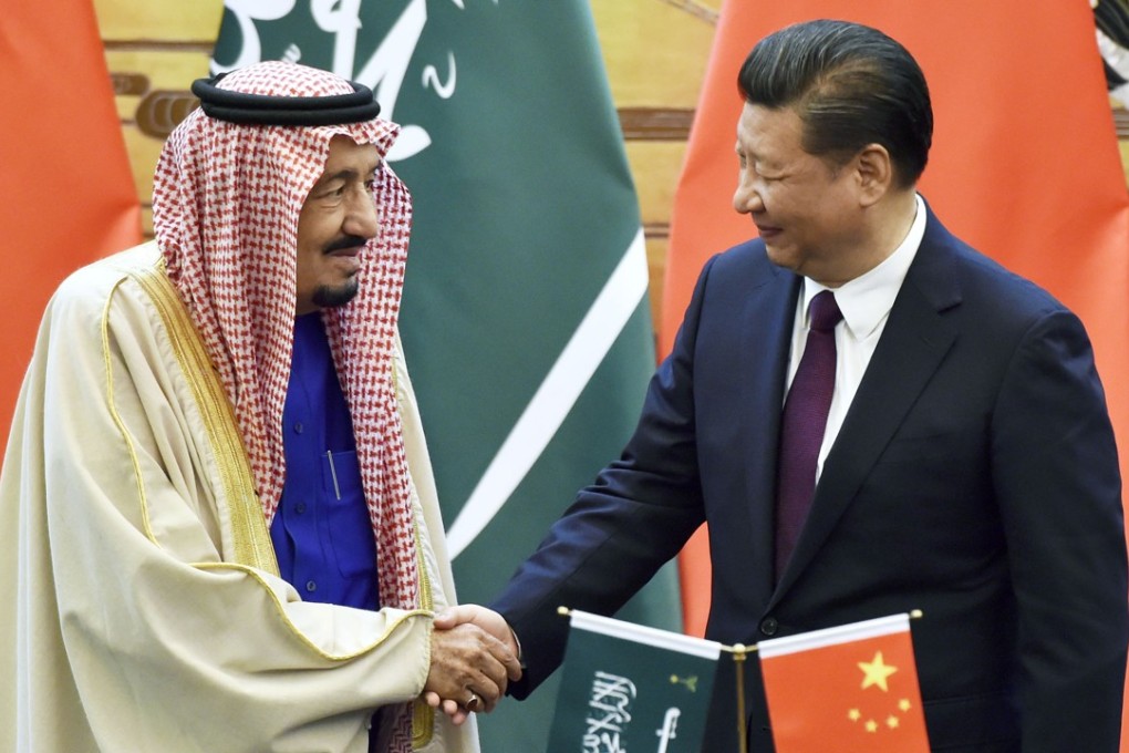 Chinese President Xi Jinping (right) and Saudi Arabia’s King Salman shake hands at Beijing’s Great Hall of the People in March. Photo: Kyodo
