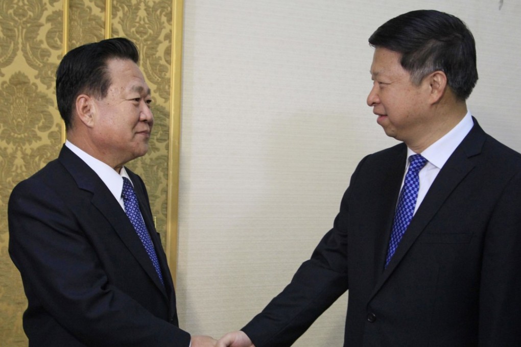 Choe Ryong Hae, left, vice chairman of the Central Committee of North Korea's ruling party shakes hands with Song Tao, the head of China's ruling Communist Party's International Liaison Department, at the Mansudae Assembly Hall, in Pyongyang, Friday, November 17, 2017. The highest-level Chinese envoy to North Korea in two years arrived in the country’s capital on Friday . Photo: Associated Press