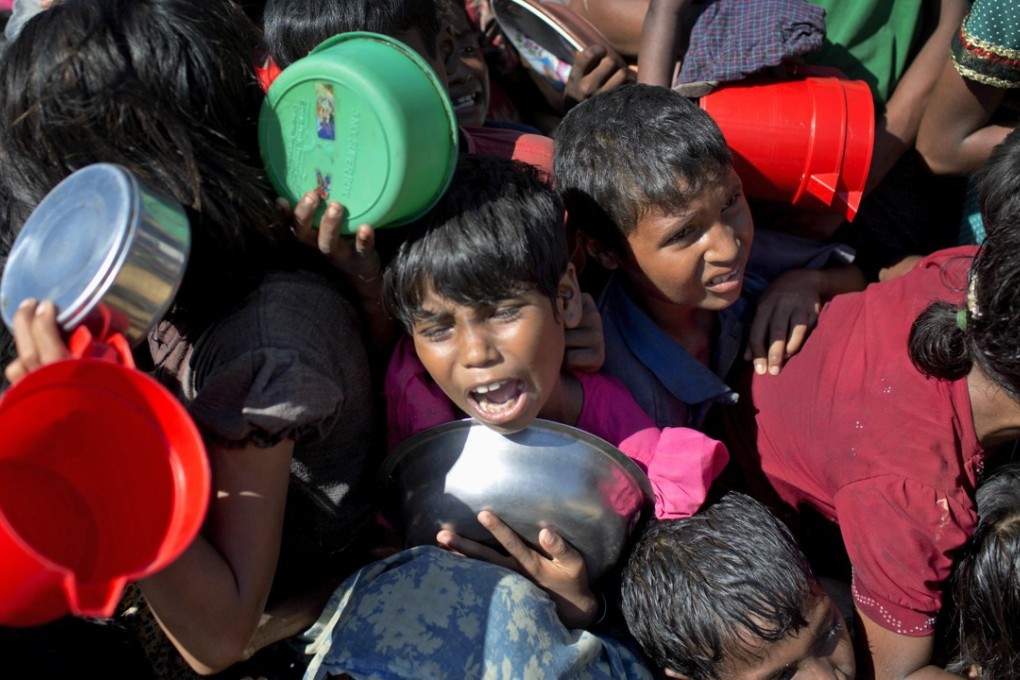 China’s Foreign Minister Wang Yi will seek to mediate in the Rohingya refugee crisis during his visit to Myanmar and Bangladesh. Photo: AP