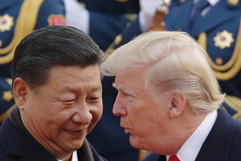 Chinese President Xi Jinping chats to US President Donald Trump during a welcoming ceremony at the Great Hall of the People in Beijing, on November 9. Photo: AP