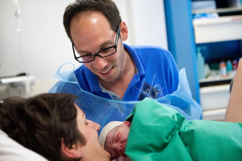 Fathers may attend the birth of their child because they feel they should be there, not because they want to be there. Photo: Alamy