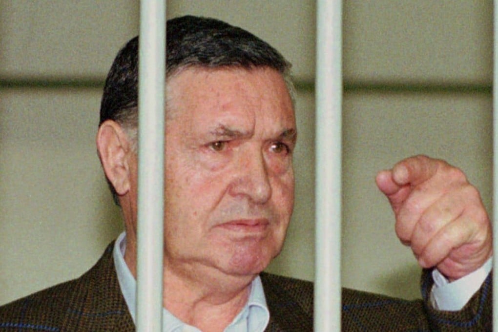 Mafia “boss of bosses” Salvatore “Toto” Riina, is seen behind bars, during a trial in Rome. Italy’s justice minister has given special permission for family bedside visits to the comatose top mafia boss as he is close to death. Photo: AP