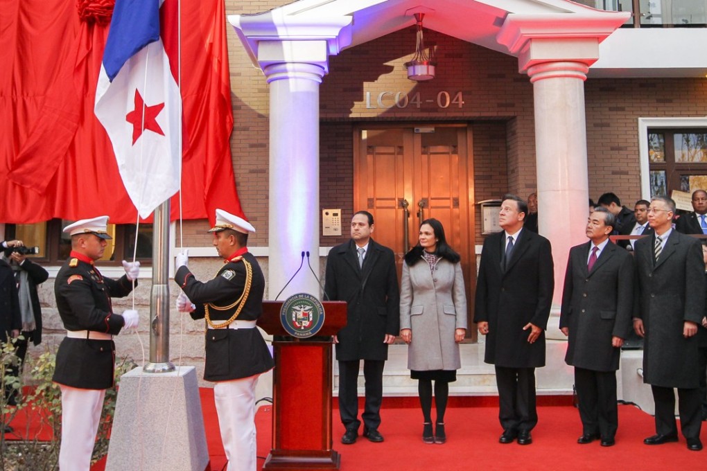 Panama’s President Juan Carlos Varela (centre, main group) and Chinese Foreign Minister Wang Yi (fourth from left) attend the inauguration ceremony for the Embassy of the Republic of Panama in China in Beijing on Thursday. Photo: Simon Song