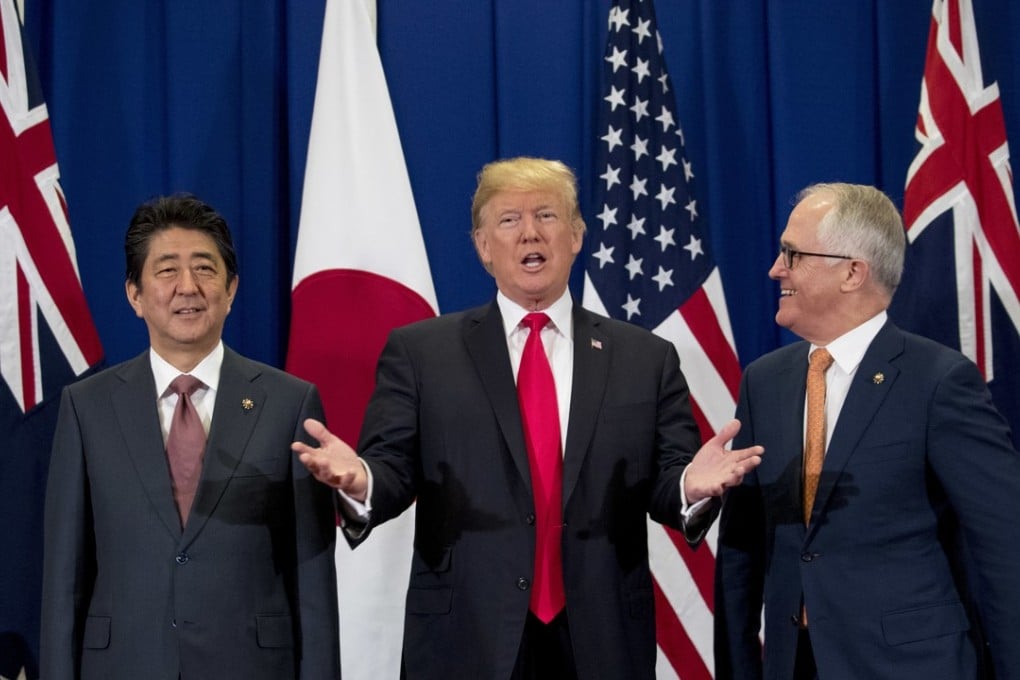 Japanese Prime Minister Shinzo Abe, US President Donald Trump and Australian Prime Minister Malcolm Turnbull. Photo: AP