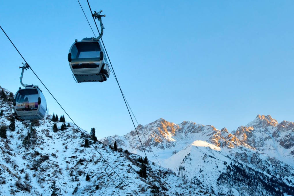 Cable cars going to and from the Shymbulak Ski Resort, one of the best places to ski in Kazakhstan. Photo: Alamy