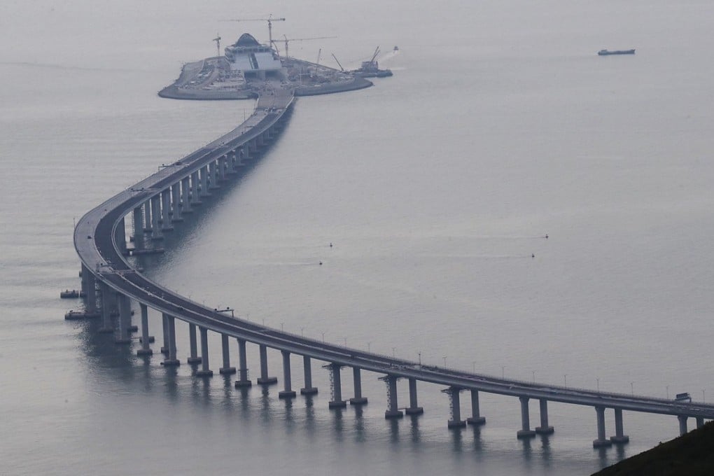 The 55km crossing, which is a combination of bridges and a tunnel, has been under construction since 2011 and will link three major cities in the Pearl River Delta. Photo: Edward Wong