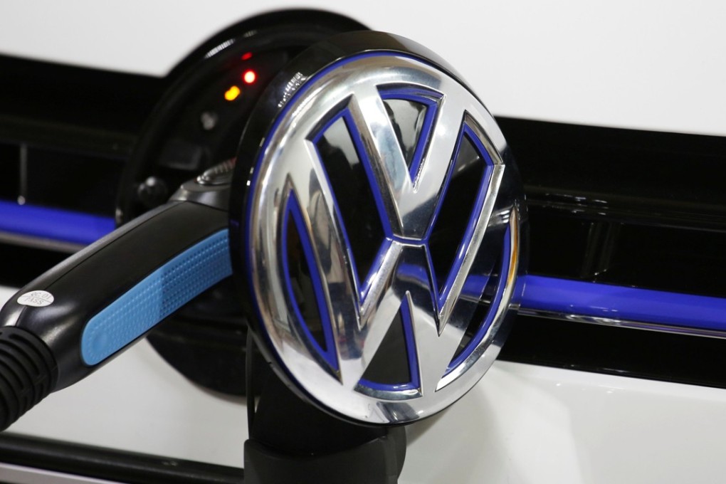 A Volkswagen Golf GTE is being charged during a workshop before an Auto Guangzhou in Guangzhou, China, on November 16, 2017. The company plans to spend US$40 billion to develop electric cars. Photo: Reuters