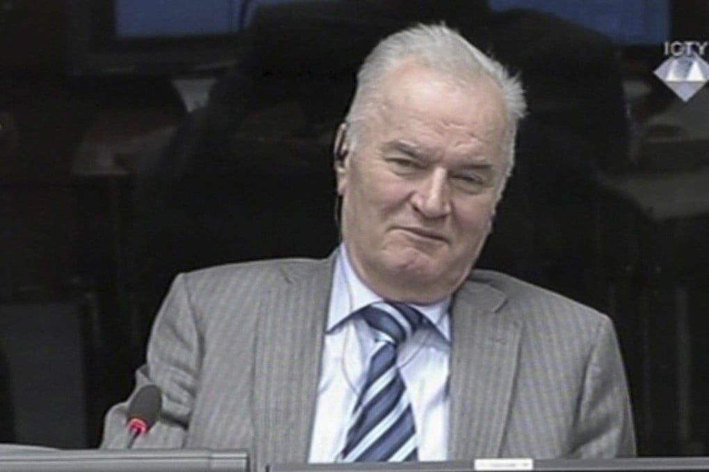 Former Bosnian Serb military chief Ratko Mladic smiles during his appearance at the Yugoslav war crimes tribunal in The Hague, Netherlands in 2014. File photo: AP )