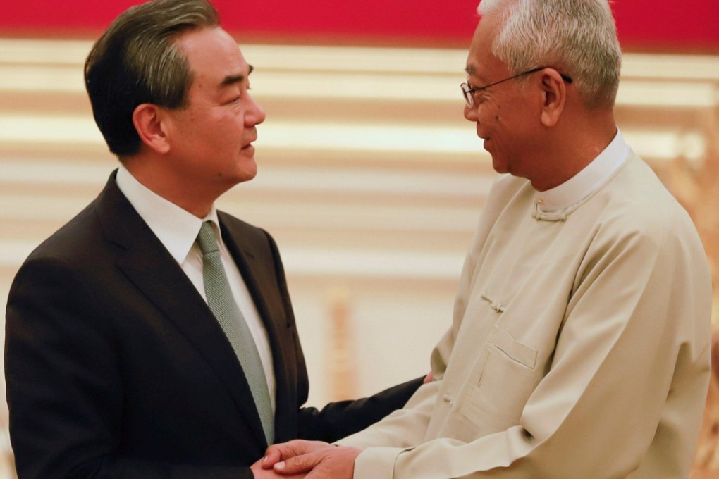 Chinese Foreign Minister Wang Yi (left) meets Myanmese President Htin Kyaw at the Presidential Palace in Naypyitaw, Myanmar, on Sunday. Photo: Reuters