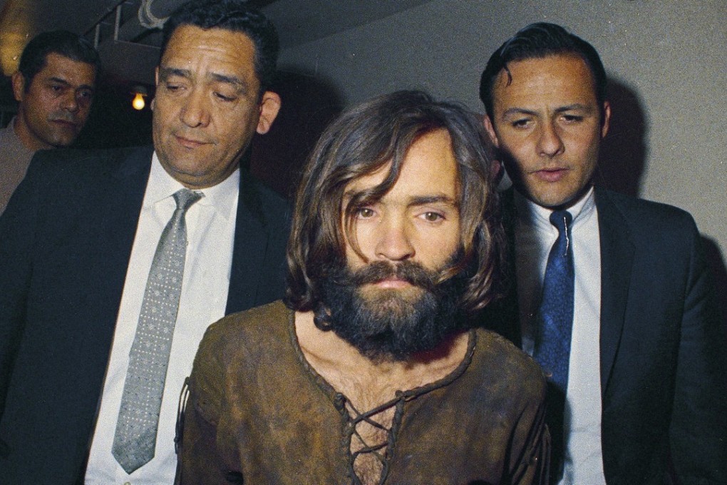In this 1969 file photo, Charles Manson is escorted to his arraignment on conspiracy-murder charges in connection with the Sharon Tate murder case. Photo: AP