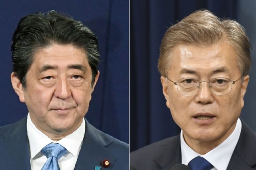 Undated combined photo shows Japanese Prime Minister Shinzo Abe (L) and South Korean President Moon Jae In. The two leaders spoke by phone on May 11, 2017, according to a Japanese official, their first talks since Moon was sworn in the previous day. (Kyodo) ==Kyodo