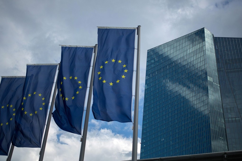 The stars of the European Union on banners flying outside the European Central Bank headquarters in Frankfurt, Germany. Photo: Bloomberg