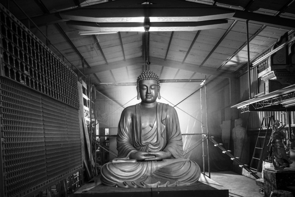 The titular statue in The Great Buddha+.