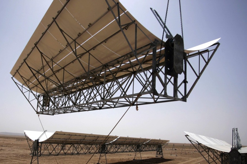 Workers build a thermo-solar power plant in Beni Mathar, Morocco. Morocco has earned praise for its commitment to using renewables, getting nearly 30 per cent of its energy from such sources. Photo: Reuters