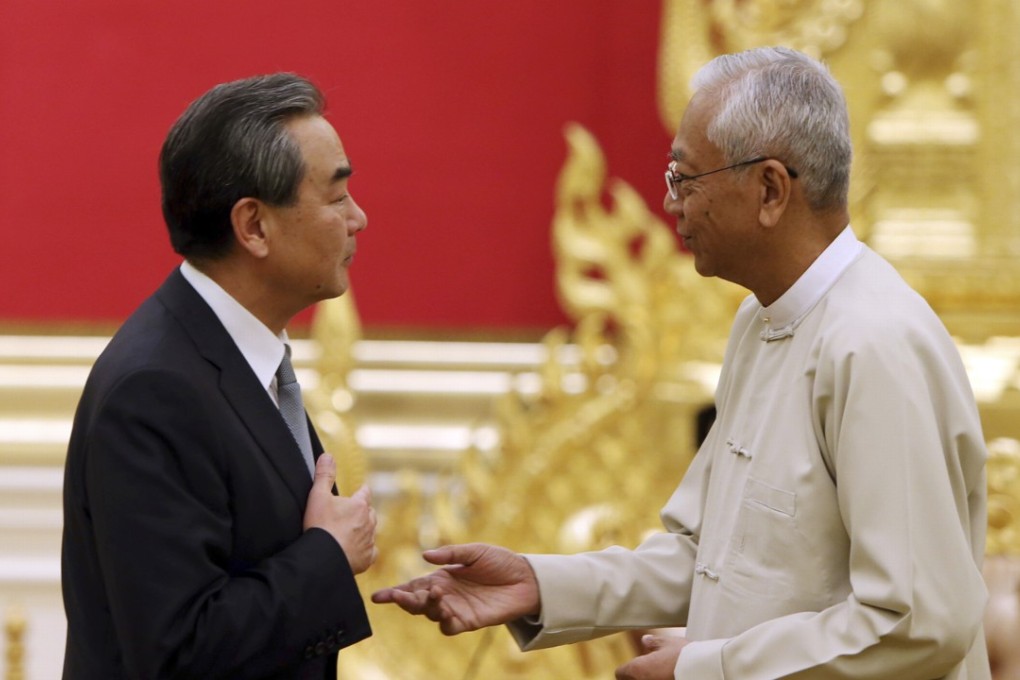 Chinese Foreign Minister Wang Yi (left) meets Myanmese President Htin Kyaw at the Presidential Palace in Naypyitaw, Myanmar. Photo: AP