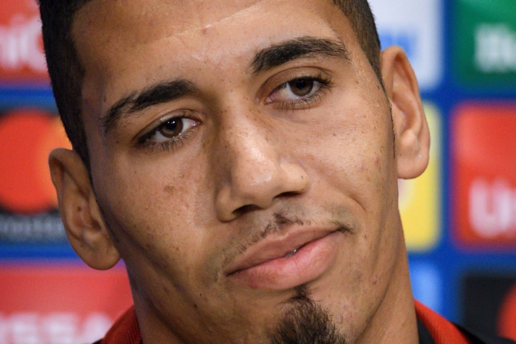 Chris Smalling speaks to the media ahead of Manchester United’s Champions League game against Basel. Photo: AFP