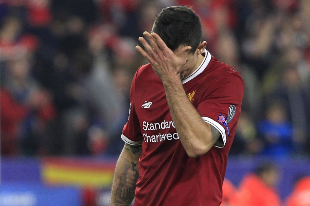 Dejan Lovren looks dejected at the end of the match. Photo: AP