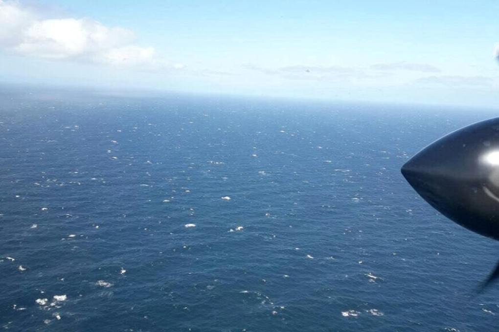 An Argentine Navy airplane is seen as it flies over the Atlantic Ocean during the search for the ARA San Juan submarine on Wednesday. Photo: Reuters