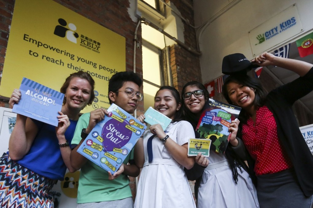 (From left) KELY Support Group programme coordinator Katherine Hampton with youth participants Jud Domingo Flores, Ivanna Wolfinbarger, Ahmedzai Areej and executive director Sky Siu. Photo: Jonathan Wong