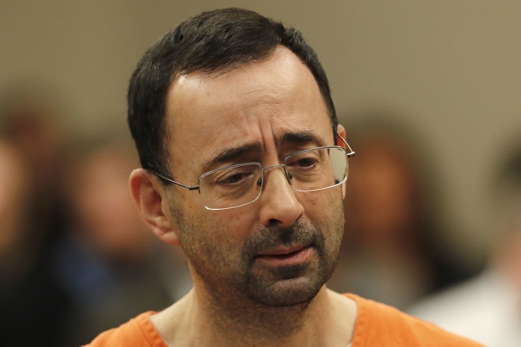 Doctor Larry Nassar appears in court in Lansing, Michigan, on Wednesday, November 22, 2017. Nasser, a sports doctor accused of molesting girls while working for USA Gymnastics and Michigan State University, pleaded guilty to multiple charges of sexual assault and will face at least 25 years in prison. Photo: AP
