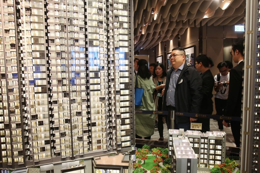 Buying a flat in Hong Kong comes with legal fees and administrative delays because of the need to review transactions that date back 15 years. Photo: David Wong