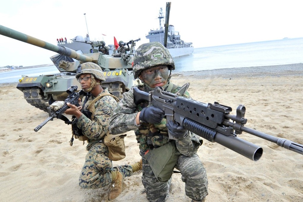 South Korean and US soldiers take position on a beach during a joint landing operation in Pohang, 270km southeast of Seoul. Photo: AFP