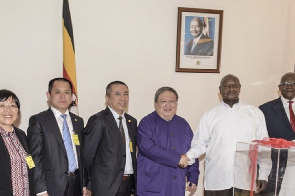 Patrick Ho greets Ugandan President Yoweri Museveni in May last year. Photo: China Energy Fund Committee