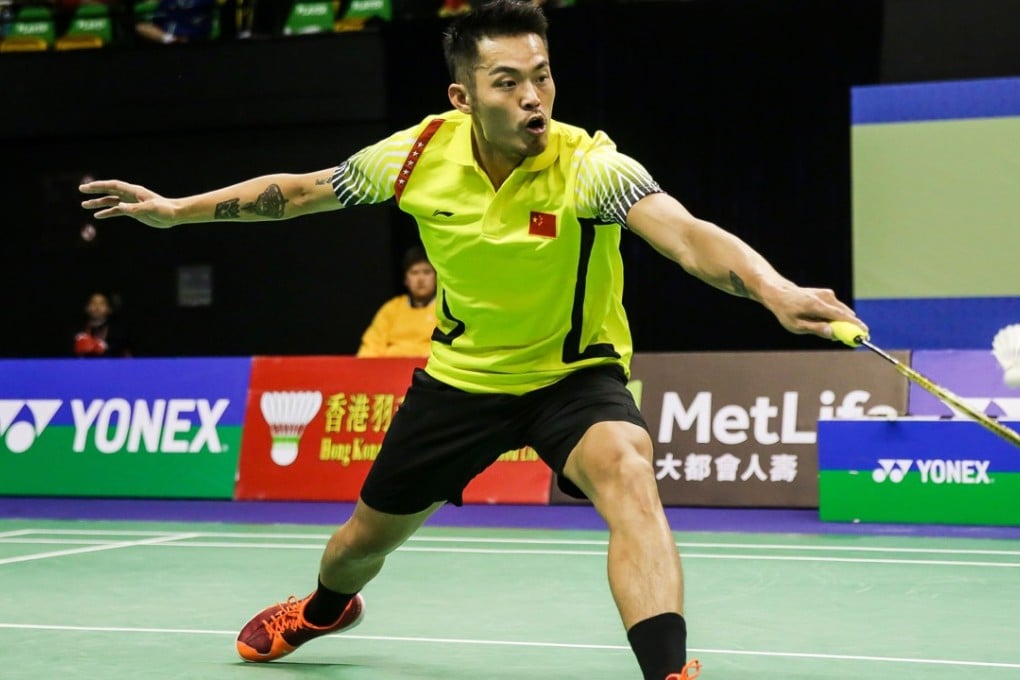 China's Lin Dan hits a shot against China's Shi Yuqi during their quarterfinal men's singles match at the Hong Kong Open. Photos: AFP