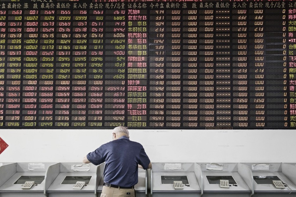 A securities brokerage in Shanghai. Coal and insurance stocks were the biggest drags on the Chinese market on Friday. Photo: Bloomberg