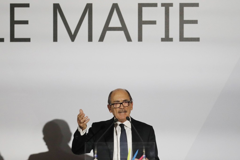 Italian anti-Mafia and counterterrorism prosecutor Federico Cafiero De Raho delivers a speech during a meeting in Milan on Thursday. Photo: AP