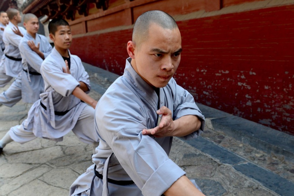 Monks practice Kongfu at Shaolin Temple in Dengfeng, central China's Henan Province. Photo: Xinhua