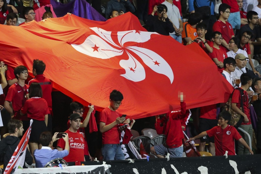 Hong Kong fans boo the Chinese national anthem during an international soccer match this month. It’s probably only a matter of time before some fans are jailed for doing so, the writer argues. Picture: K. Y. Cheng