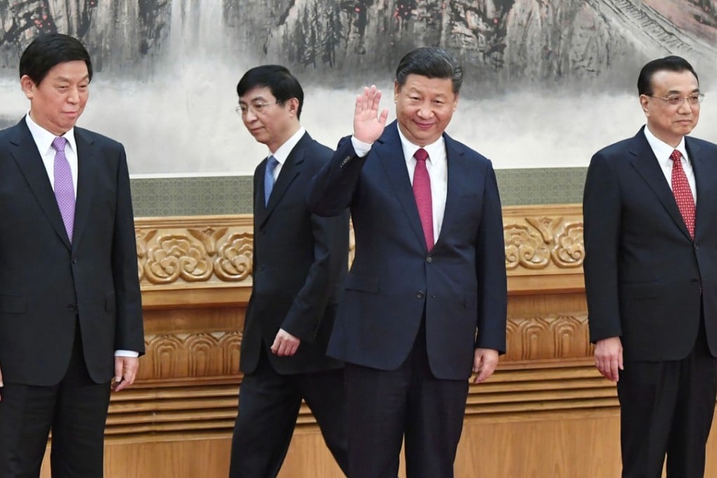 Chinese President Xi Jinping appears with his new leadership team at the Great Hall of the People in Beijing last month. China’s Politburo is now dominated by Xi loyalists. Photo: Kyodo