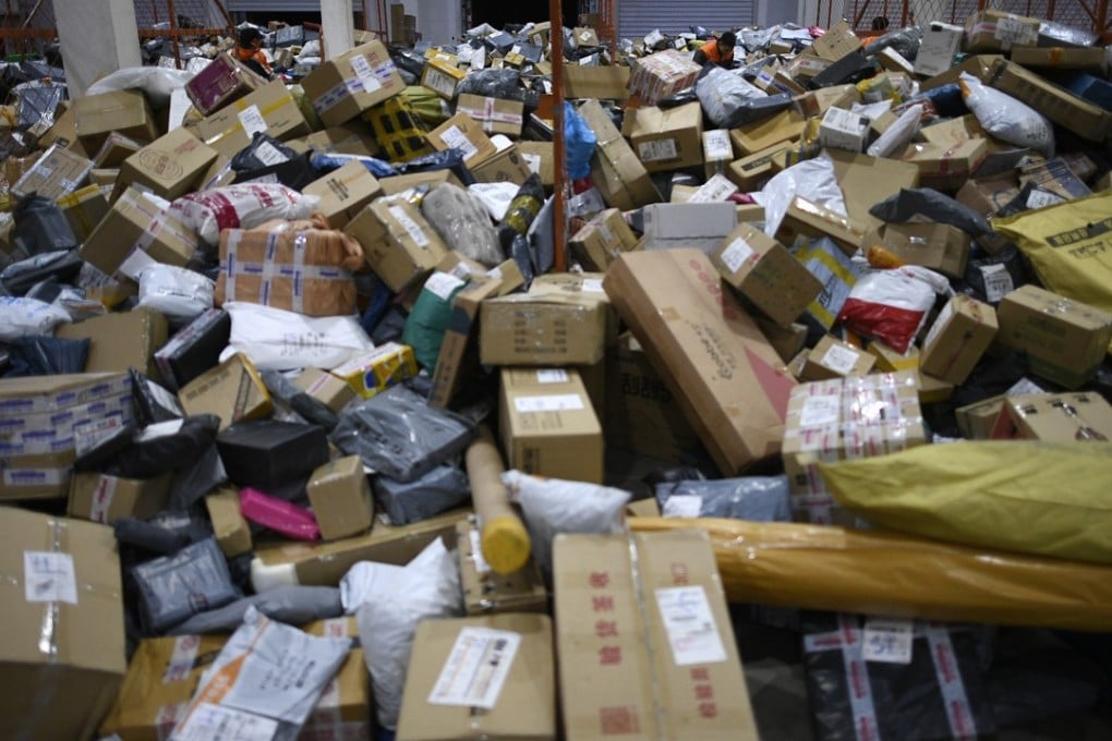 Workers deal with packages at a courier in Yinchuan in Ningxia on November 14, 2017. At least 331 million packages were handled by Chinese postal and courier companies on Singles' Day online shopping spree on Nov. 11, 31.5 per cent more than the same day last year. Photo: Xinhua.