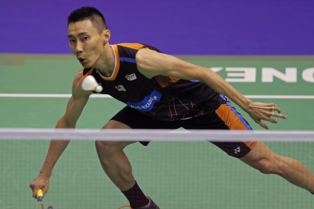 Malaysia’s Lee Chong Wei eyes the shuttlecock as he plays a shot against China’s Chen Long during the men’s singles final of the Yonex-Sunrise Hong Kong Open. Photo: AP