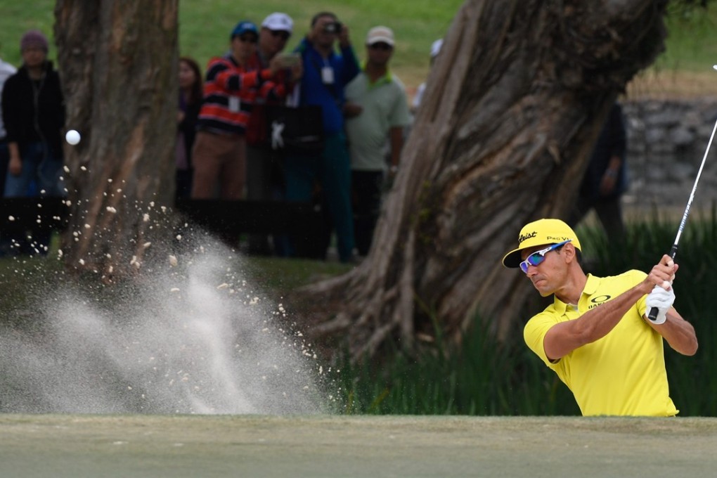 Rafa Cabrera Bello of Spain hits out of a bunker at the Hong Kong Open. Photo: Richard Castka