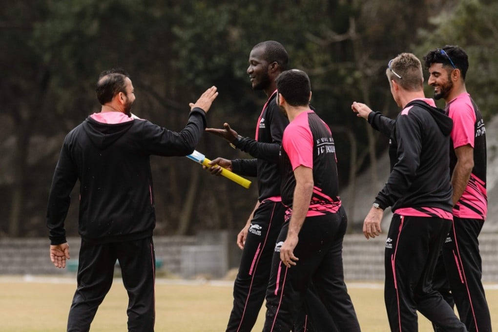 West Indies cricketer Darren Sammy (2L) with the Hung Hom JD Jaguars at the 2017 Blitz. Photo: AFP