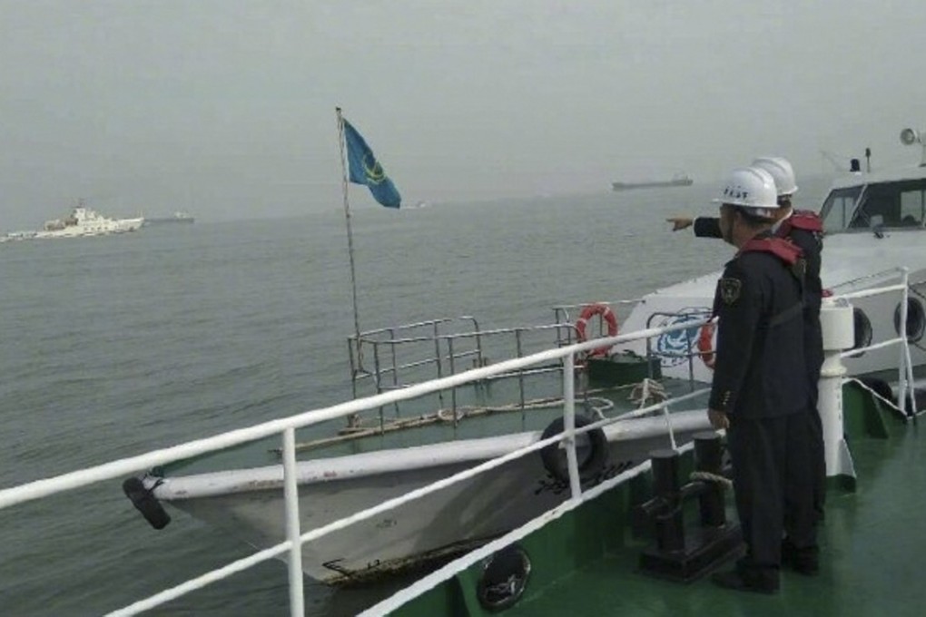 Rescuers are still searching for 12 crew members from a Jiangsu cargo ship that sank at about 3am. Photo: China National Radio