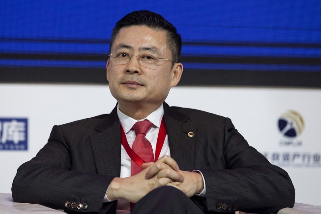 HNA Group chief executive Adam Tan Xiangdong told the Caijing financial conference in Beijing that the company would “listen to orders” and “not invest a cent in areas forbidden by the government”. Photo: Bloomberg
