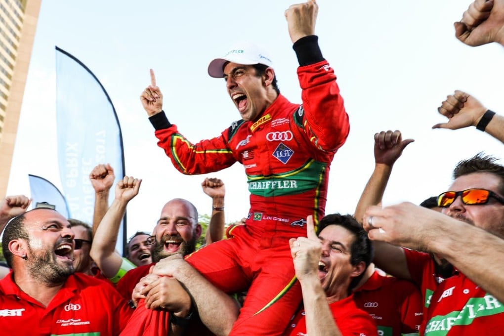 Lucas di Grassi celebrates winning his first Formula E title with his team. Photo: Formula E