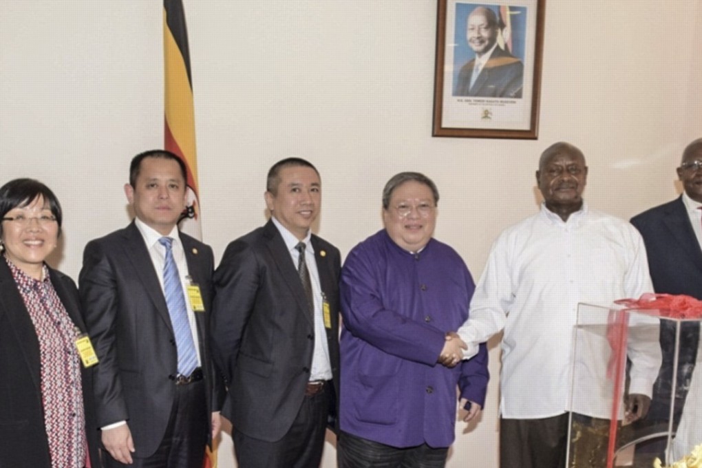 Ho Chi-ping (centre) meets Ugandan President Yoweri Museveni in 2016. Photo: China Energy Fund Committee
