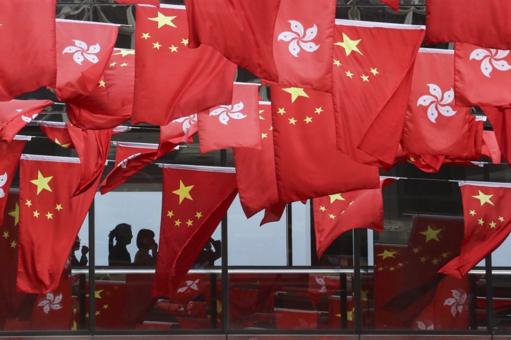 Hong Kong SAR and Chinese national flags set up in rows around East Tsim Sha Tsui mark the 20th anniversary of the handover, on June 26. Photo: Felix Wong