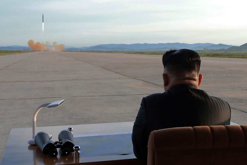 North Korean leader Kim Jong-Un inspects a launching drill of the medium-and-long range strategic ballistic rocket Hwasong-12 at an undisclosed location in this undated photo released from North Korea’s official Korean Central News Agency (KCNA) on September 16, 2017. Photo: AFP/KCNA via KNS