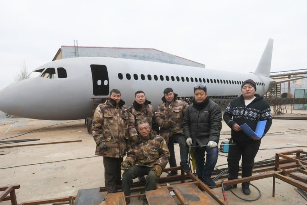 Zhu Yuechung (second from right) with the group of friends who helped build the model. Photo: Handout