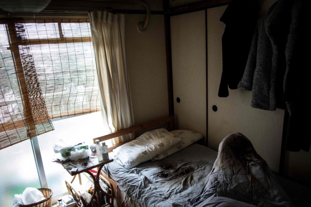 A mattress soaked with bodily fluids of a woman who died alone and left for about two weeks, in her flat in Yokohama. Photo: AFP