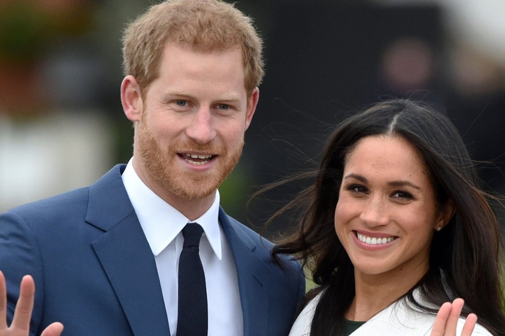Britain's Prince Harry (L) poses with his fiancée, US actress Meghan Markle after announcing their engagement in the Sunken Garden at Kensington Palace in London. Photo: EPA-EFE