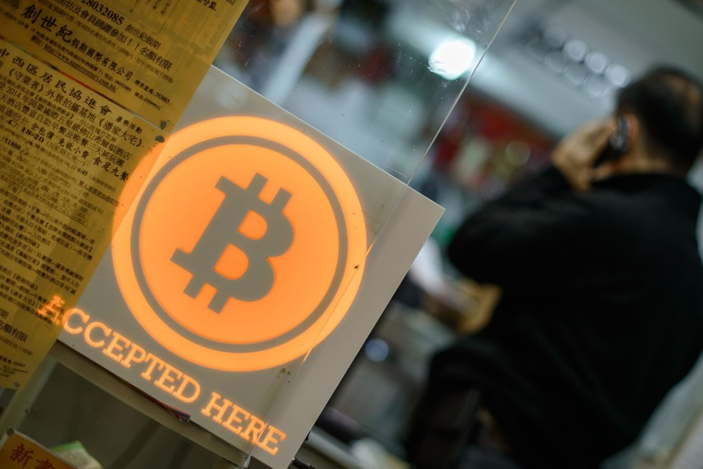 Following its acceptance of the first bitcoin payment, PwC said it would broaden its acceptance of digital currencies. Photo: AFP