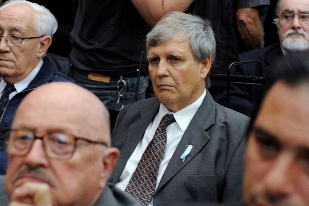 Alfredo Astiz (centre) and Jorge Eduardo Acosta (left) are seen during their sentencing hearing in Buenos Aires on Wednesday. Photo: Agence France-Presse
